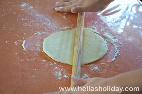 Rolling the pastry with a pin