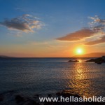 The sun setting behind the island of Naxos