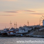 Sunset view of windmill and shipyard in Koufonisi