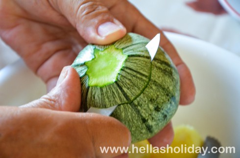 Slice off the top of round courgettes